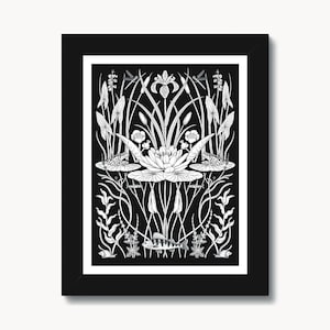 May include: Black and white illustration of a water lily with dragonflies, frogs, and fish in a pond. The illustration is framed in a black frame.