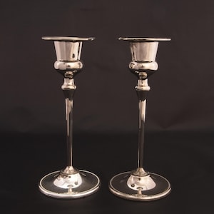 A pair of English silver-plated candlesticks