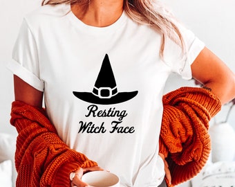 Camiseta unisex de Halloween con cara de bruja en reposo - Colores cómodos