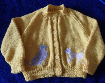NEW - Hand knitted childs cardigan featuring dogs colour of your choice and size.