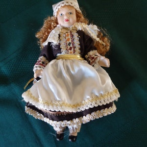 Vintage small porcelain doll &quot;rare&quot; fully porcelain with movable limbs
