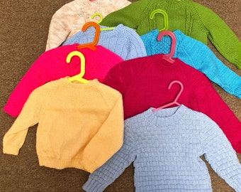 NEW Hand knitted jumpers size 4 and 1 size 5. various colours and patterns