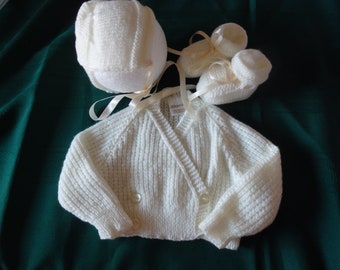 Hand knitted baby layette