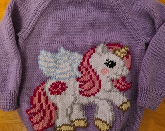 NEW - Hand knitted jumper featuring a beautiful unicorn, available in colour of your choice sizes 2 to 6