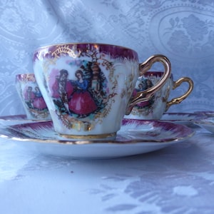 Beautiful set of 6 cups and saucers made in Japan, courting couple petite
