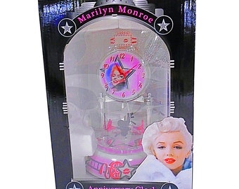 Marilyn Monroe (vintage) draaibaar, porselein en glas, jubileumklok