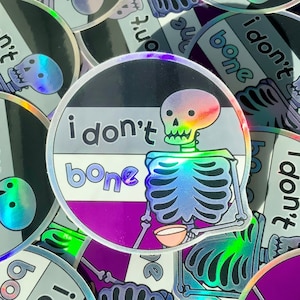 Holographic I Don&#39;t Bone Asexual Pride Sticker | Spooky Halloween LGBTQ Pun