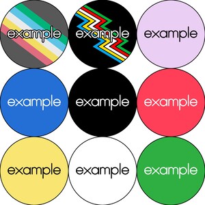May include: Nine round stickers with the word "example" in white text on a variety of coloured backgrounds. The backgrounds include grey, black with a colourful zigzag pattern, light purple, blue, black, red, yellow, white, and green.