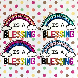 May include: Four rainbow-colored stickers with the text "Queerness is a Blessing" in black letters. The stickers are on a white background with a polka dot pattern.