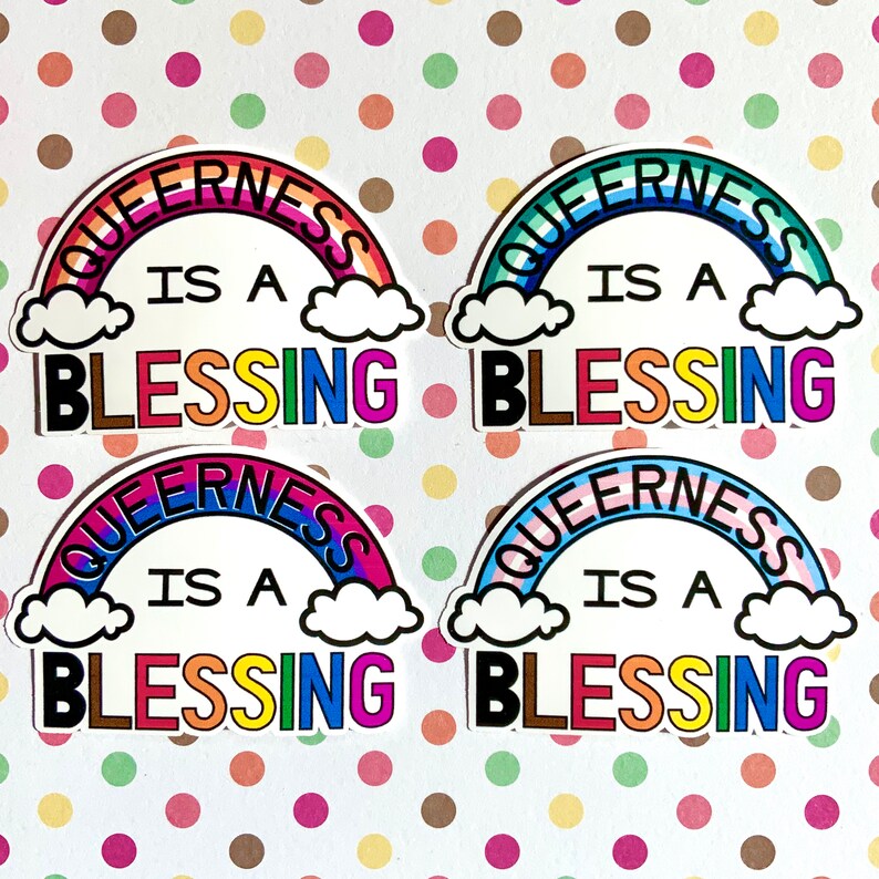 May include: Four rainbow-colored stickers with the text "Queerness is a Blessing" in black letters. The stickers are on a white background with a polka dot pattern.