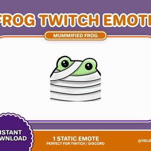 May include: A green frog wrapped in white bandages with the text "Mummified Frog" above it. The frog is a cartoon illustration and is looking at the viewer. The text "FROG TWITCH EMOTE" is at the top of the image and the text "1 STATIC EMOTE PERFECT FOR TWITCH/DISCORD" is at the bottom of the image.