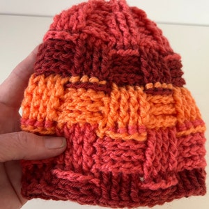 Poppenhoedje, oranje en rood, vegan, gehaakt, hoofdomtrek 30 cm, polyacryl