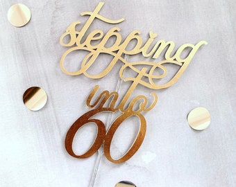 Rose Gold "Stepping Into 60" Cake Topper: Metallic Cursive