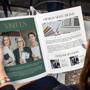 May include: A brochure with the title "Visit Us" and a photo of three women standing together. The brochure also features the title "Design Selections" and a photo of a variety of tile samples. The text on the brochure reads "The studio where inspiration & collaboration come to life. Here you'll work side-by-side with a Hampton's homes designer to discover your style inspired by the latest in design-forward finishes, and hand-select the personalized touches for a home that simply says, "wow."