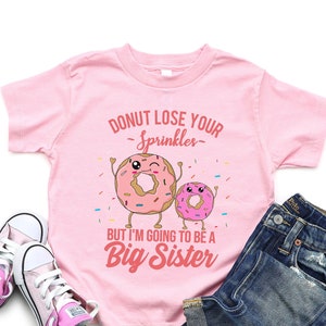 I'm Going to Be a Big Sister Funny Birth Pregnancy Announcement Toddler T-Shirt - Baby Announcement Gender Reveal Shirt Donut Outfit Meme