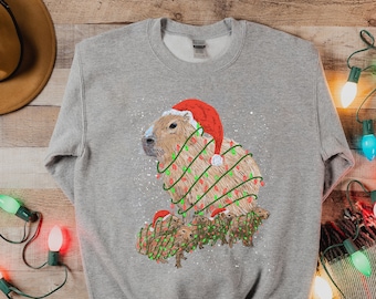 Capybara Christmas Sweatshirt - Cute Baby Animals Ugly Christmas Sweatshirt - Capybara Wrapped in Christmas Lights Holiday Men Women Outfit