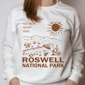 conspiracy theory UFO sweatshirt