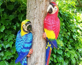 Un couple de perroquets de fer/MACAW à accrocher dans votre arbre!