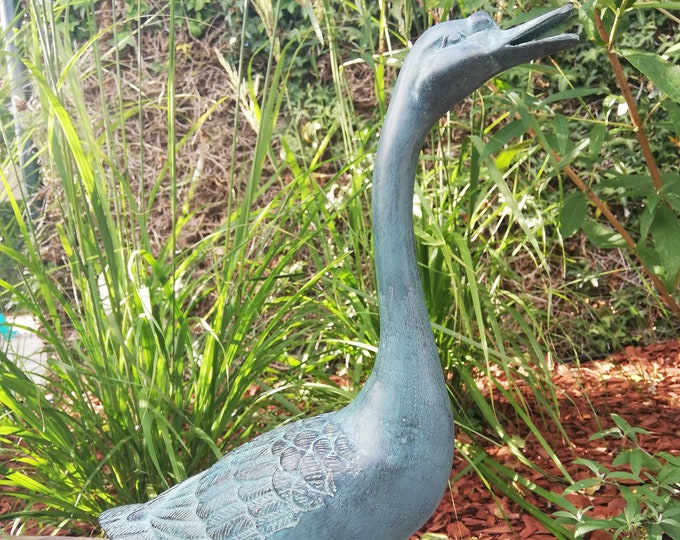 Bronze garden sculpture of a goose