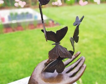 Bronze sculpture - releasing butterflies