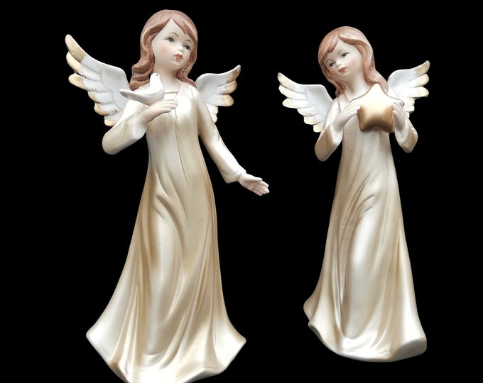 A pair of porcelain Angels - standing models