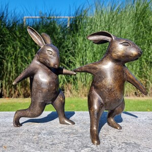 Rabbit and hare couple - Animals in love - garden sculpture