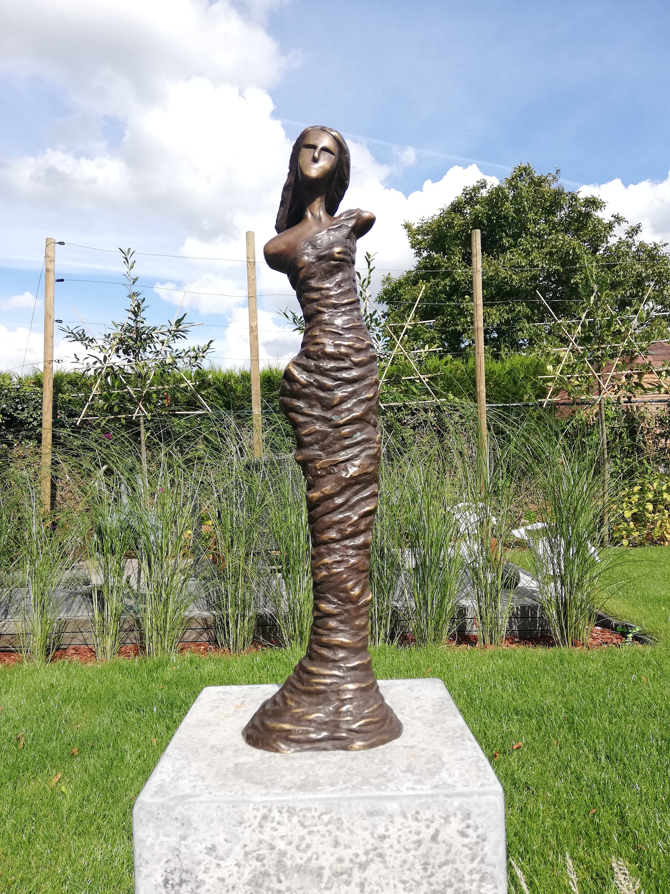 Modern bronze garden sculpture Standing woman