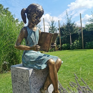 Bronze garden sculpture - Girl reading a book - Bronze children