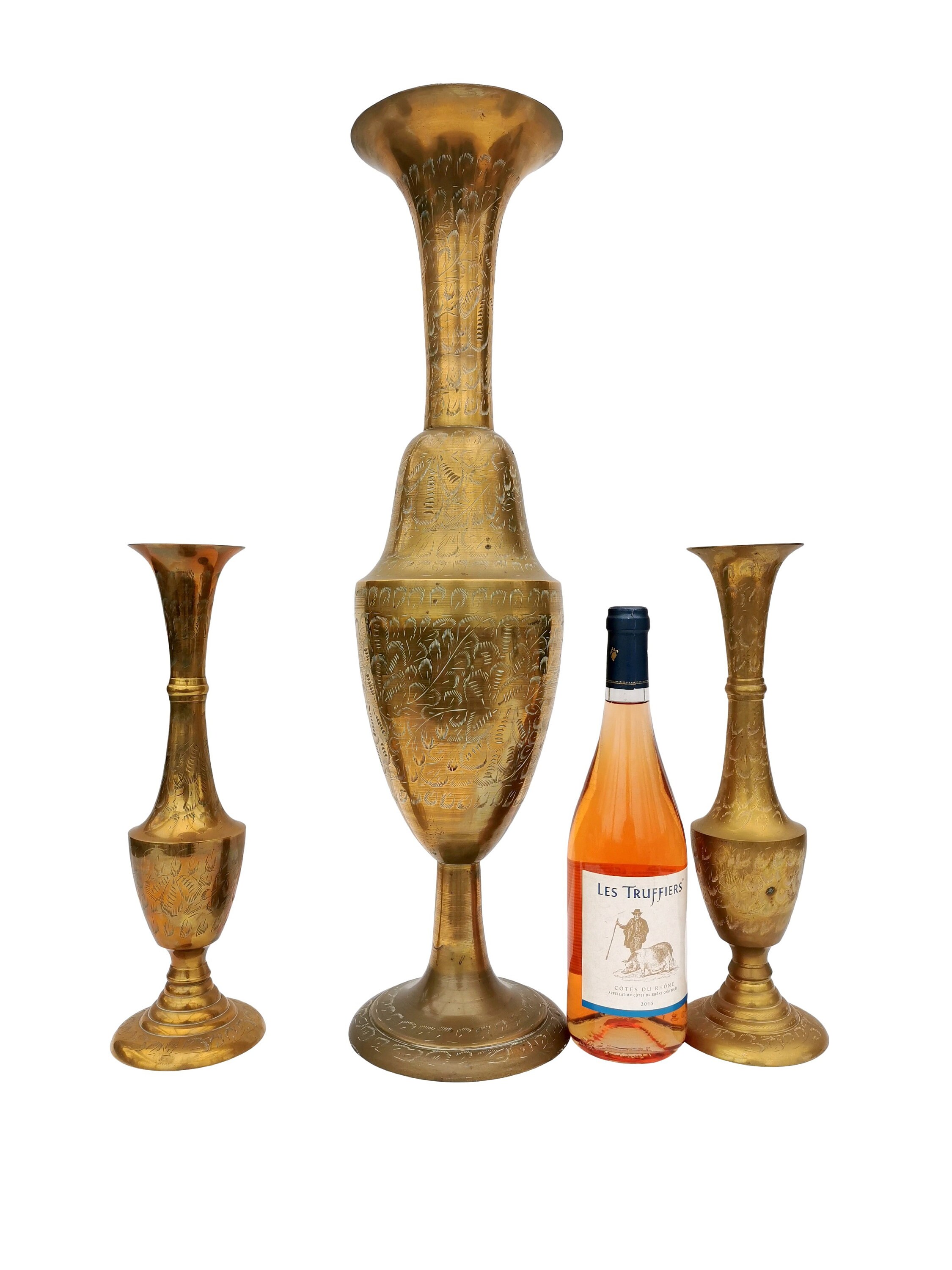 A unique set of 3 decorative copper vases