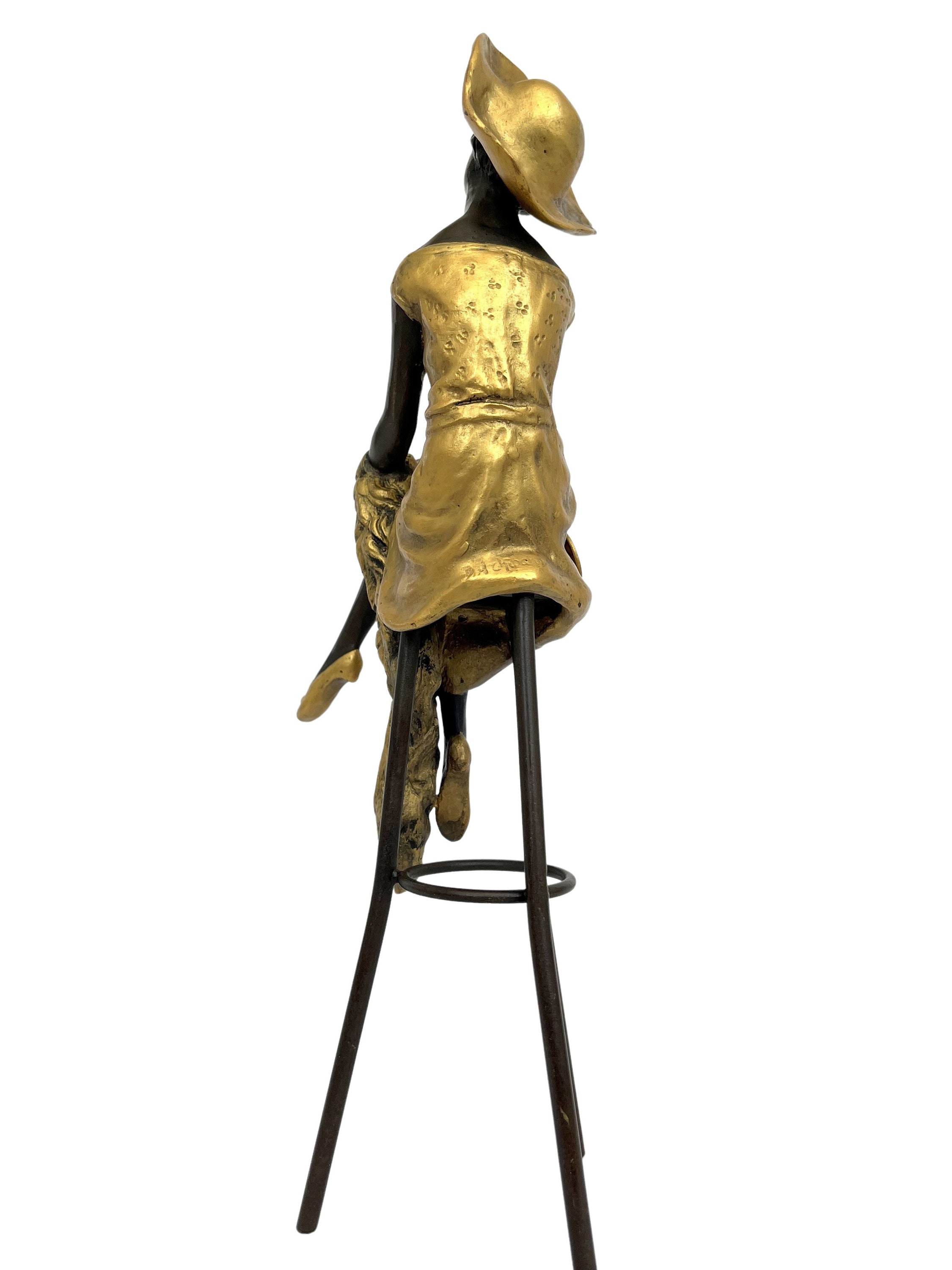 Bronze sculpture of a woman on a bar stool Graceful and elegant bronze figure Decorative