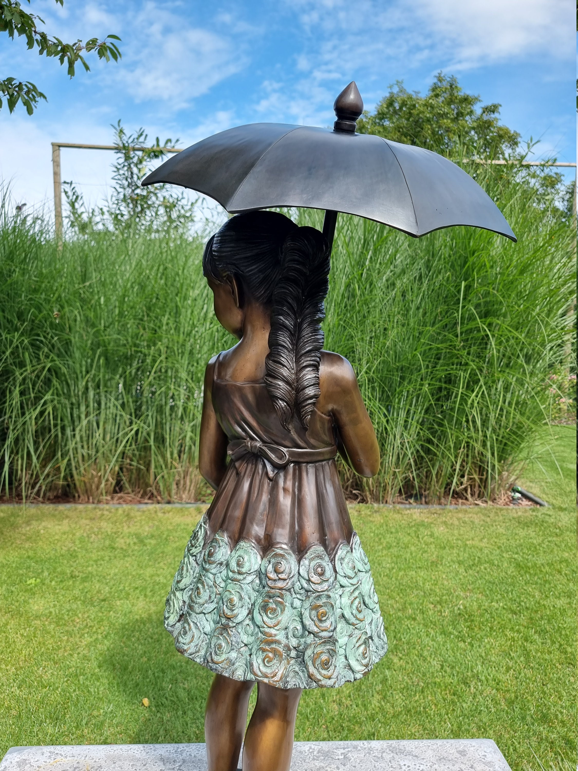 Bronze sculpture of a young lady with umbrella Bronze garden art