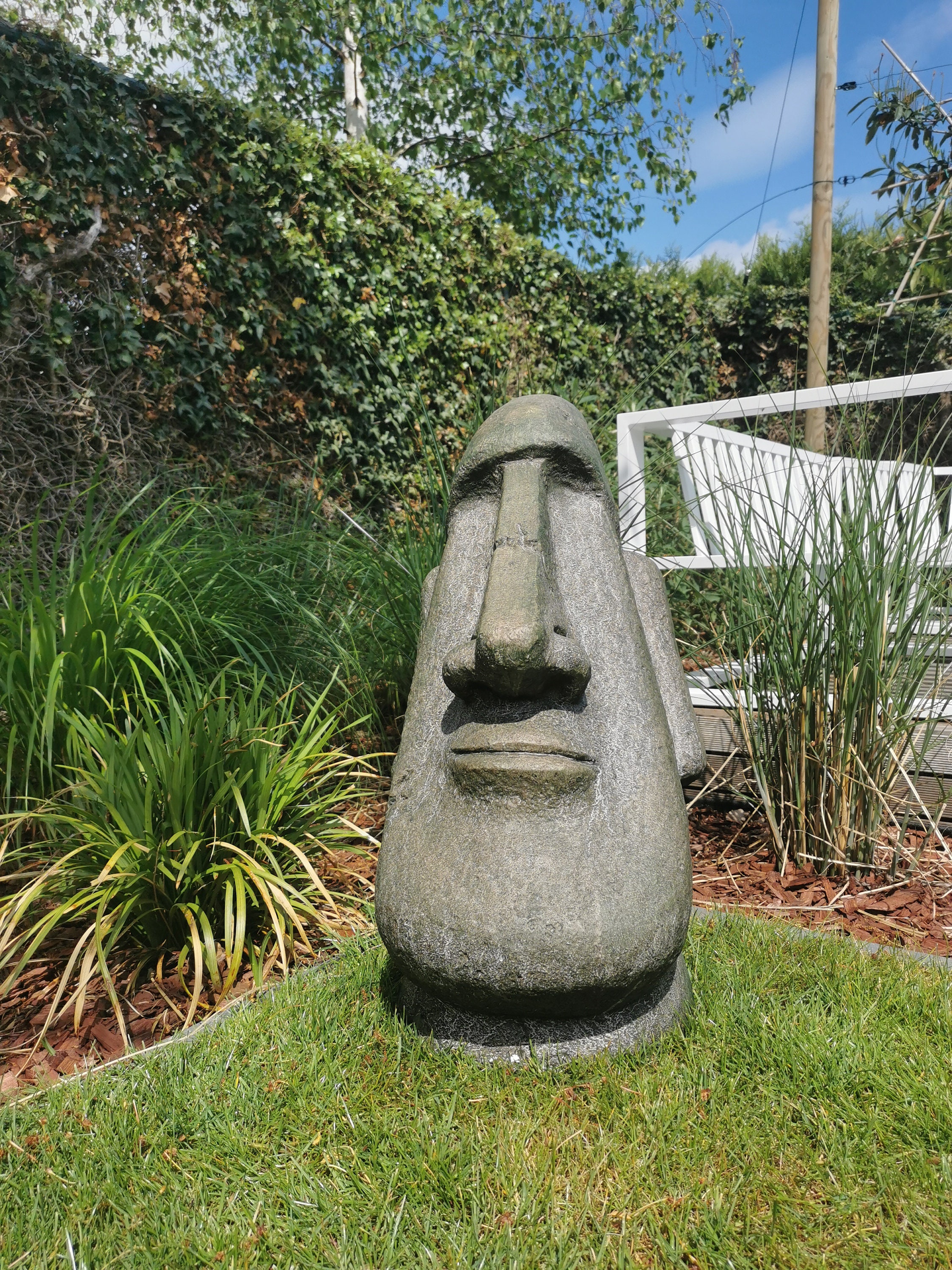 Large garden sculpture of a Moai Easter island rock Garden decor