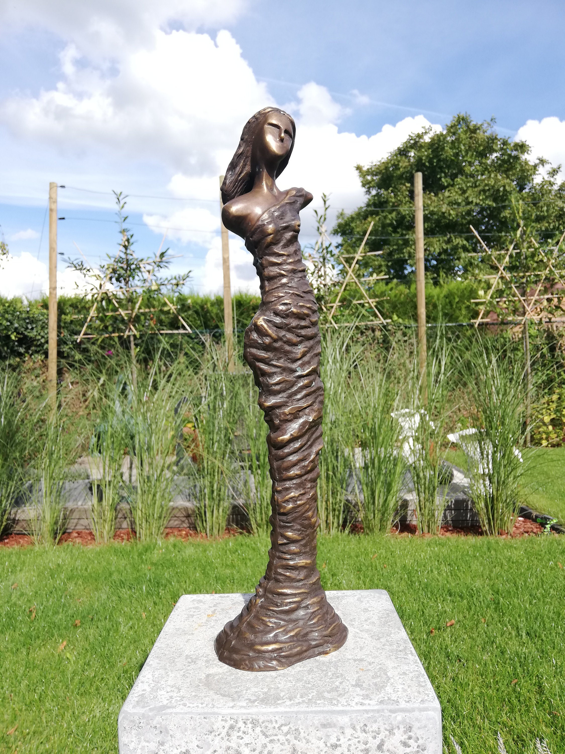 Modern bronze garden sculpture Standing woman