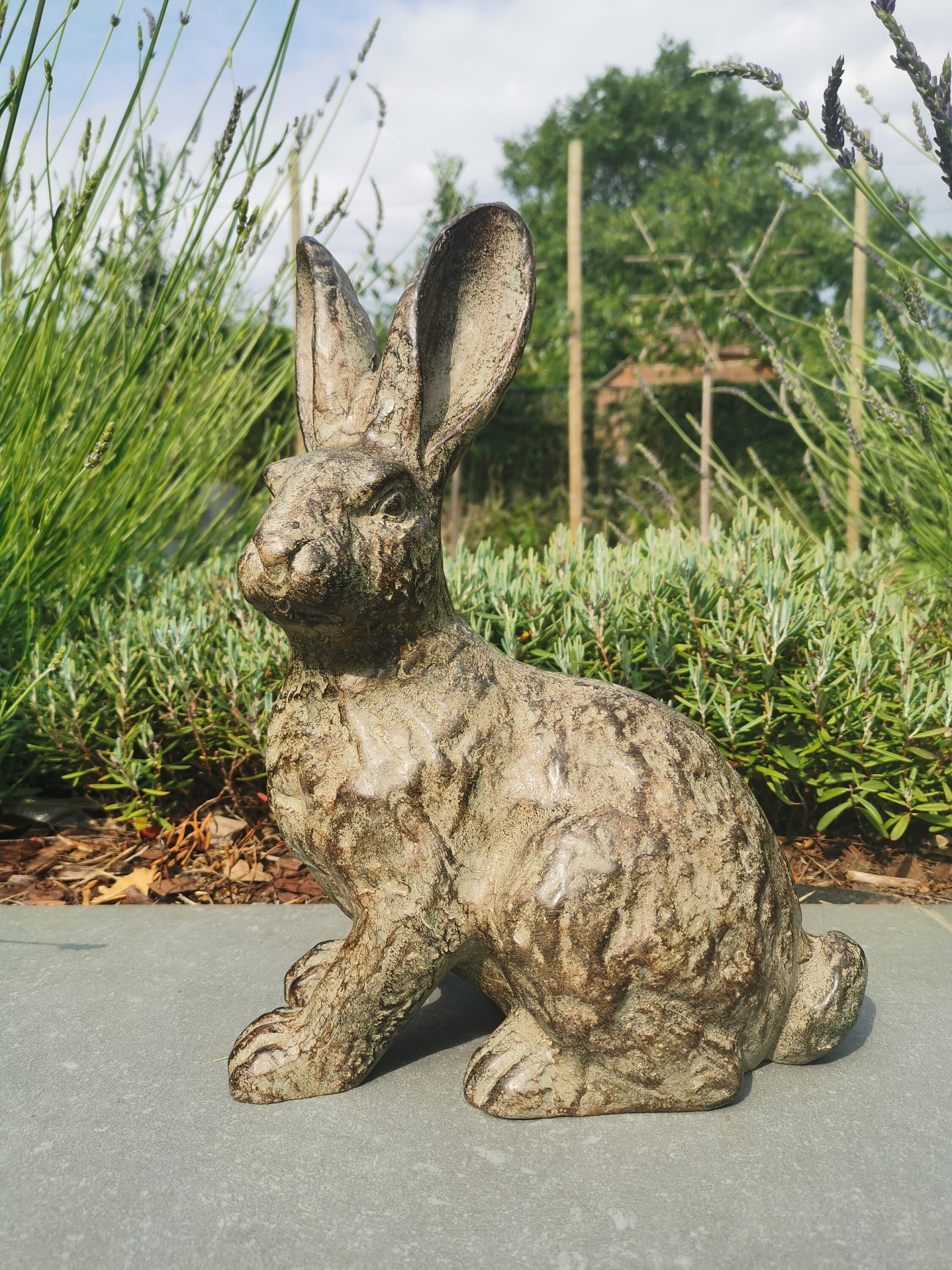 Beautiful bronze sculpture of a hare Bronze garden decor