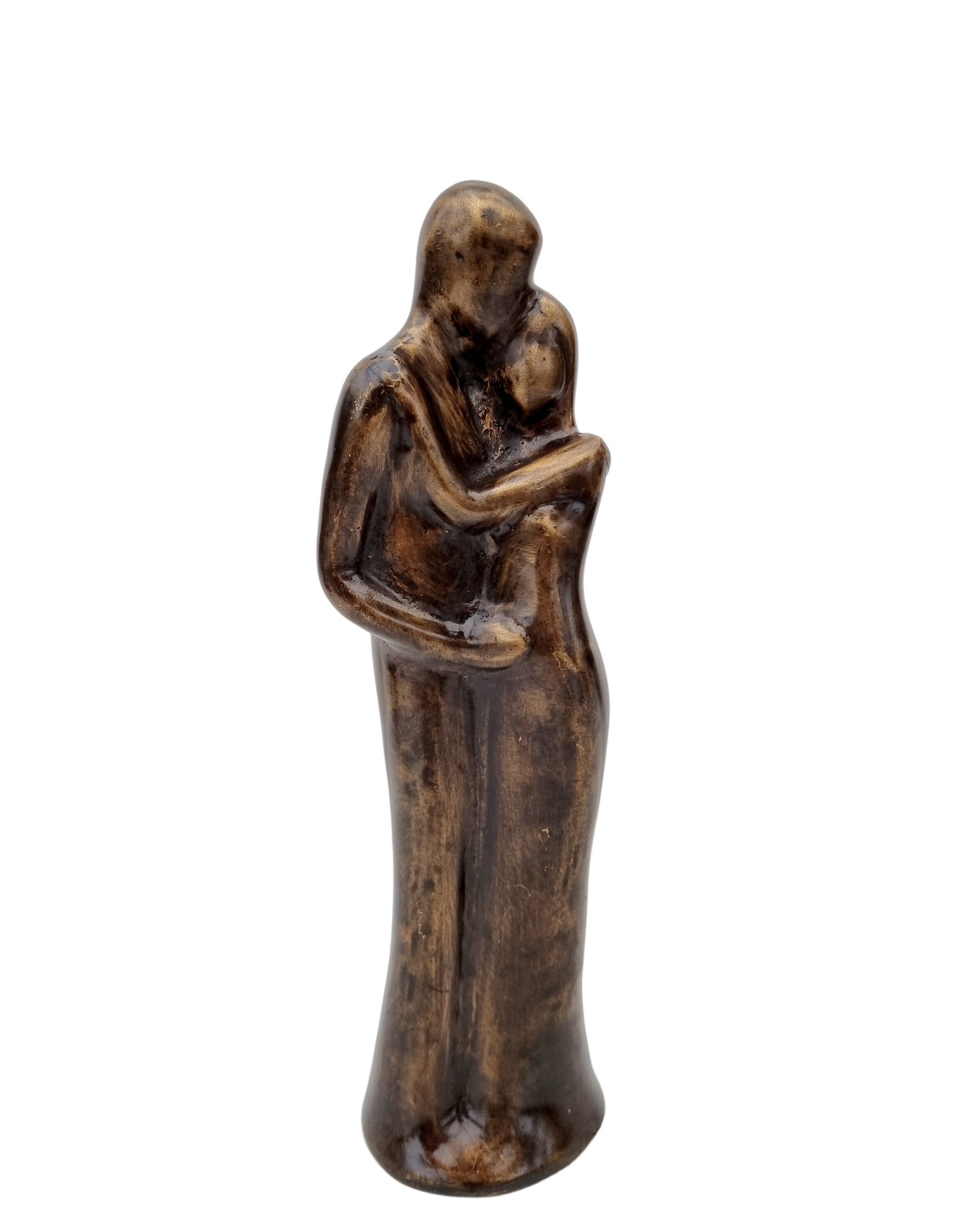 Bronze sculpture of an embracing couple Loving gift