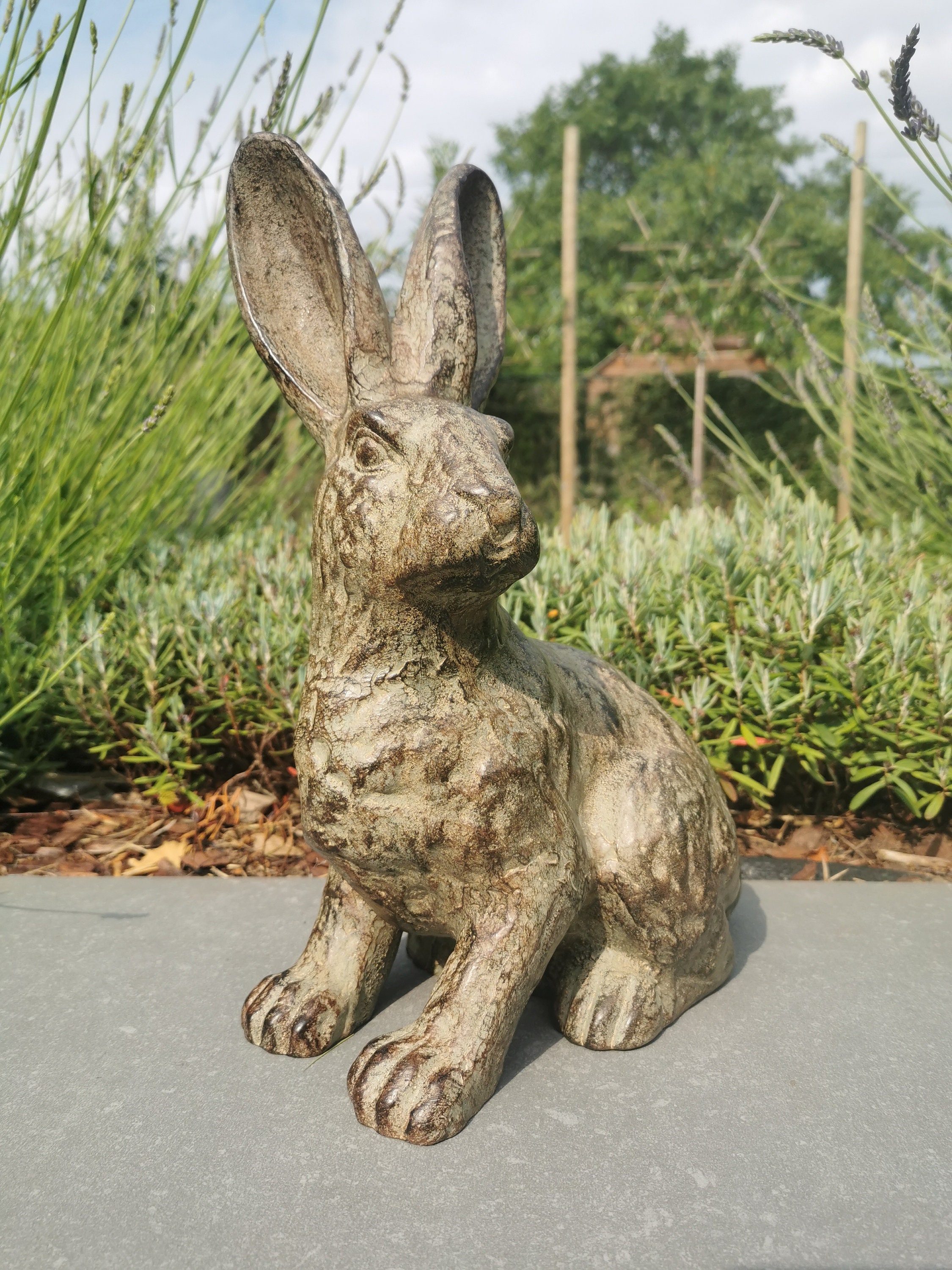 Beautiful bronze sculpture of a hare Bronze garden decor