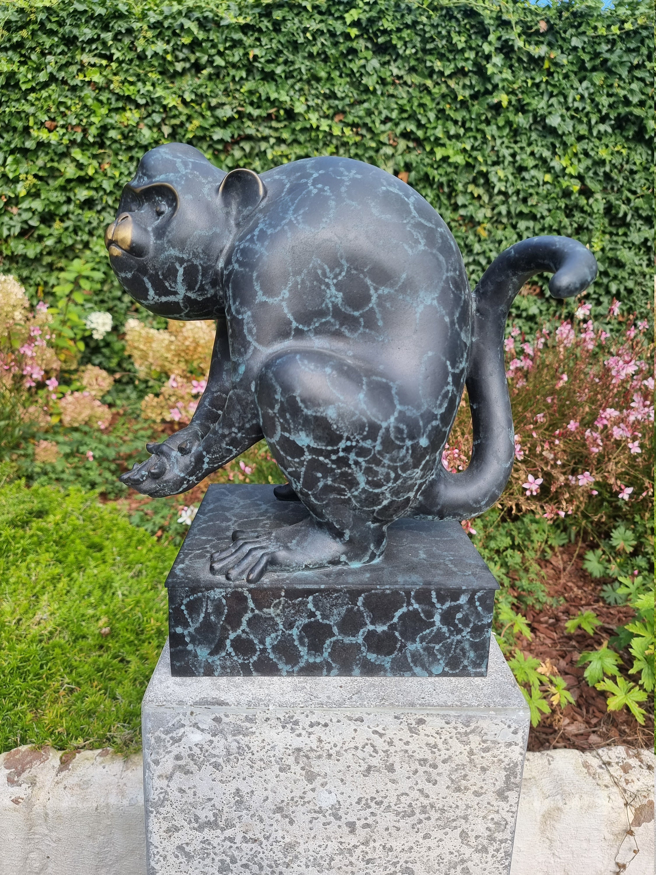 Garden sculpture of a Monkey Bronze garden sculpture Bronze animals