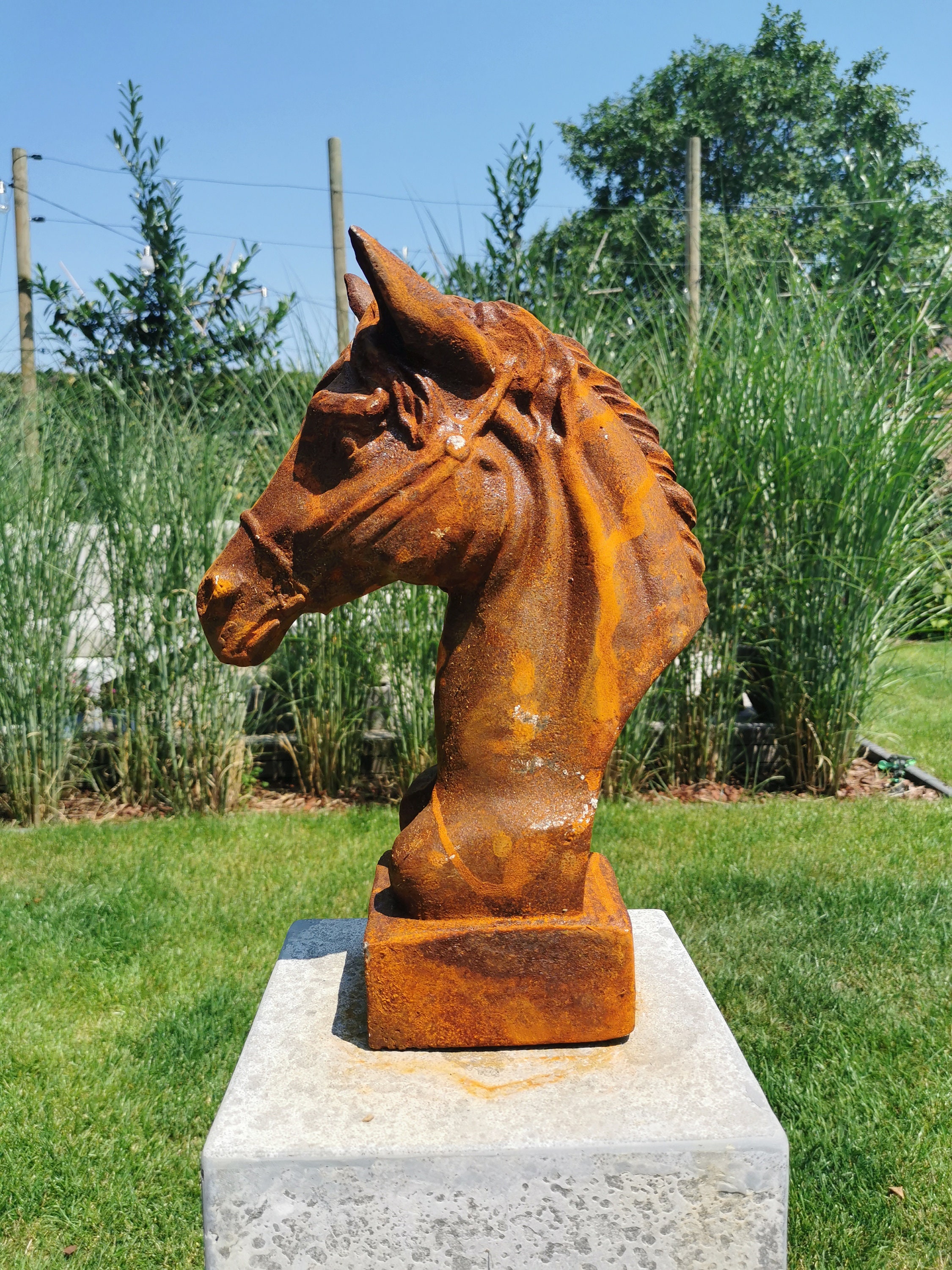 Antique style garden sculpture of a horse head Garden decor