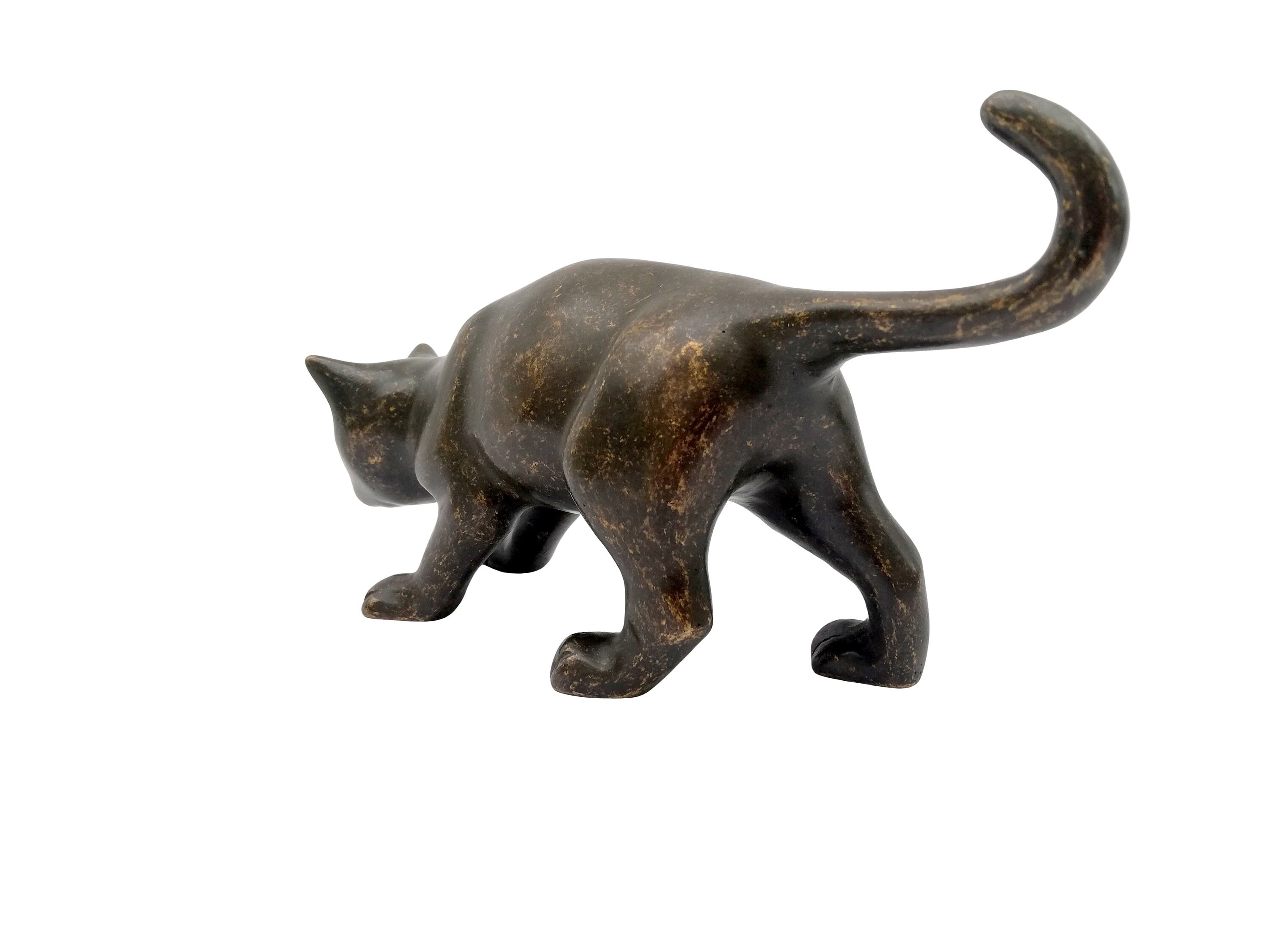 Bronze statue of a cat Curious kitten on discovery Bronze gift