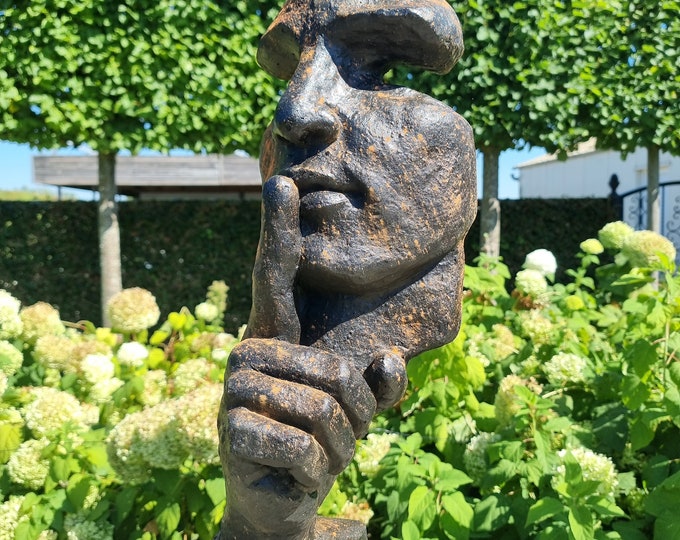 Large abstract sculpture of a male 'whispering' - garden art