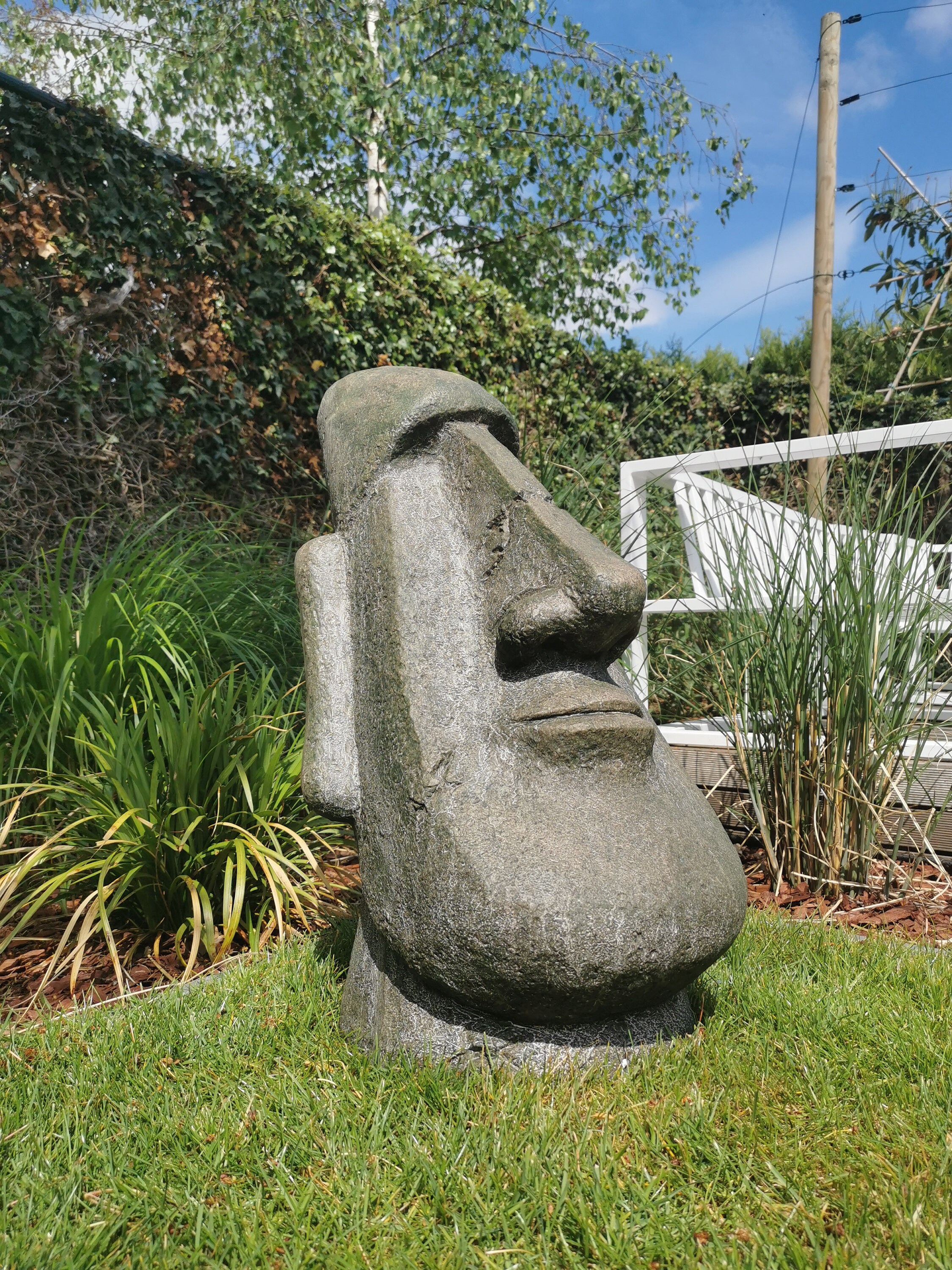 Large garden sculpture of a Moai Easter island rock Garden decor