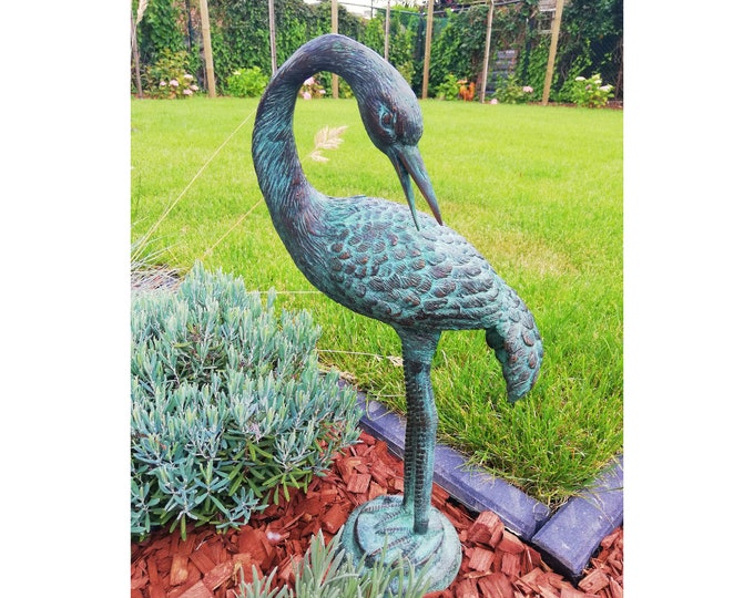 Bronze garden sculpture of a  heron