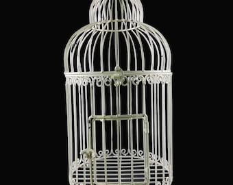 A wrought iron birdcage - decorative in garden or inside