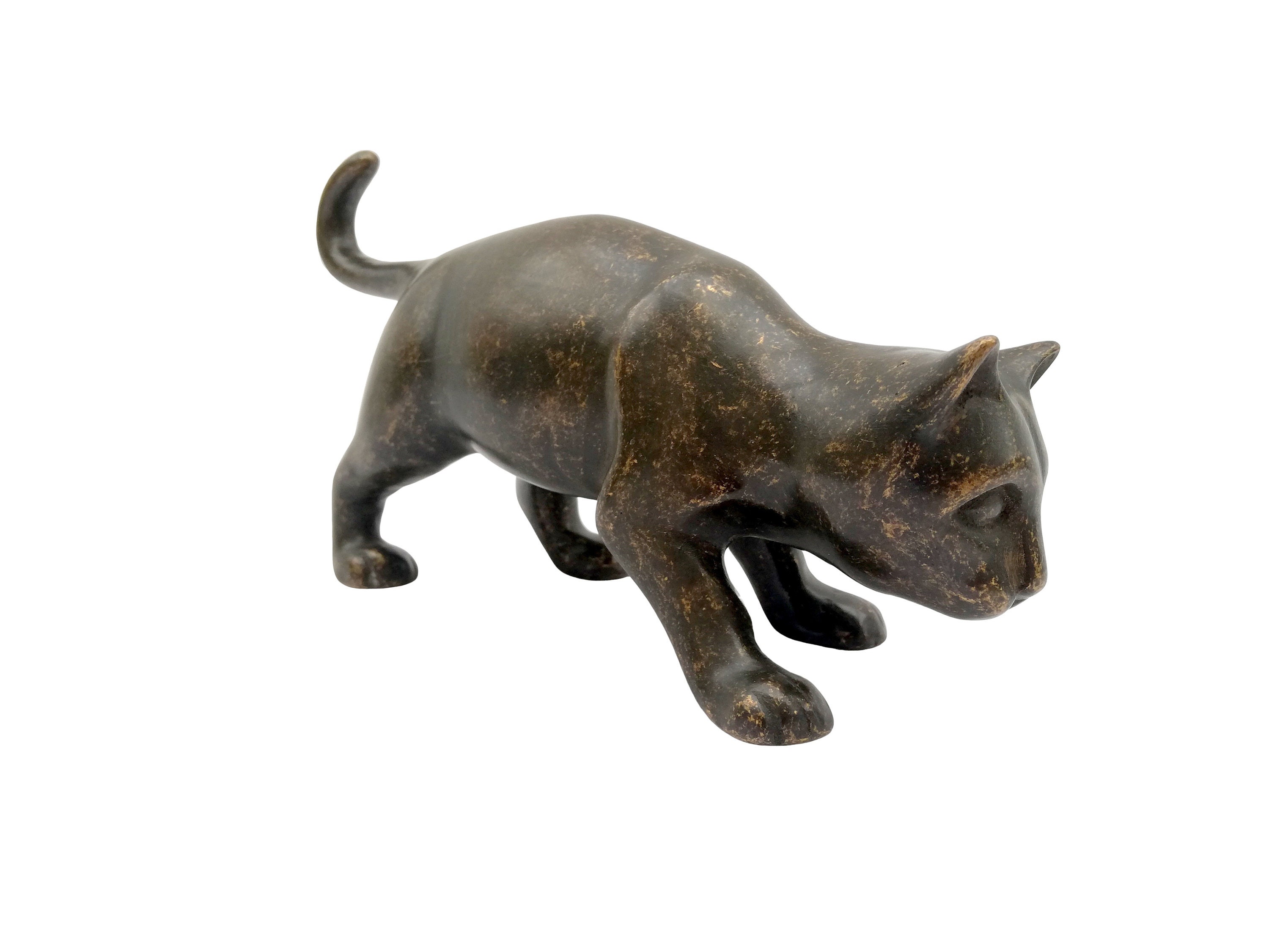 Bronze statue of a cat Curious kitten on discovery Bronze gift