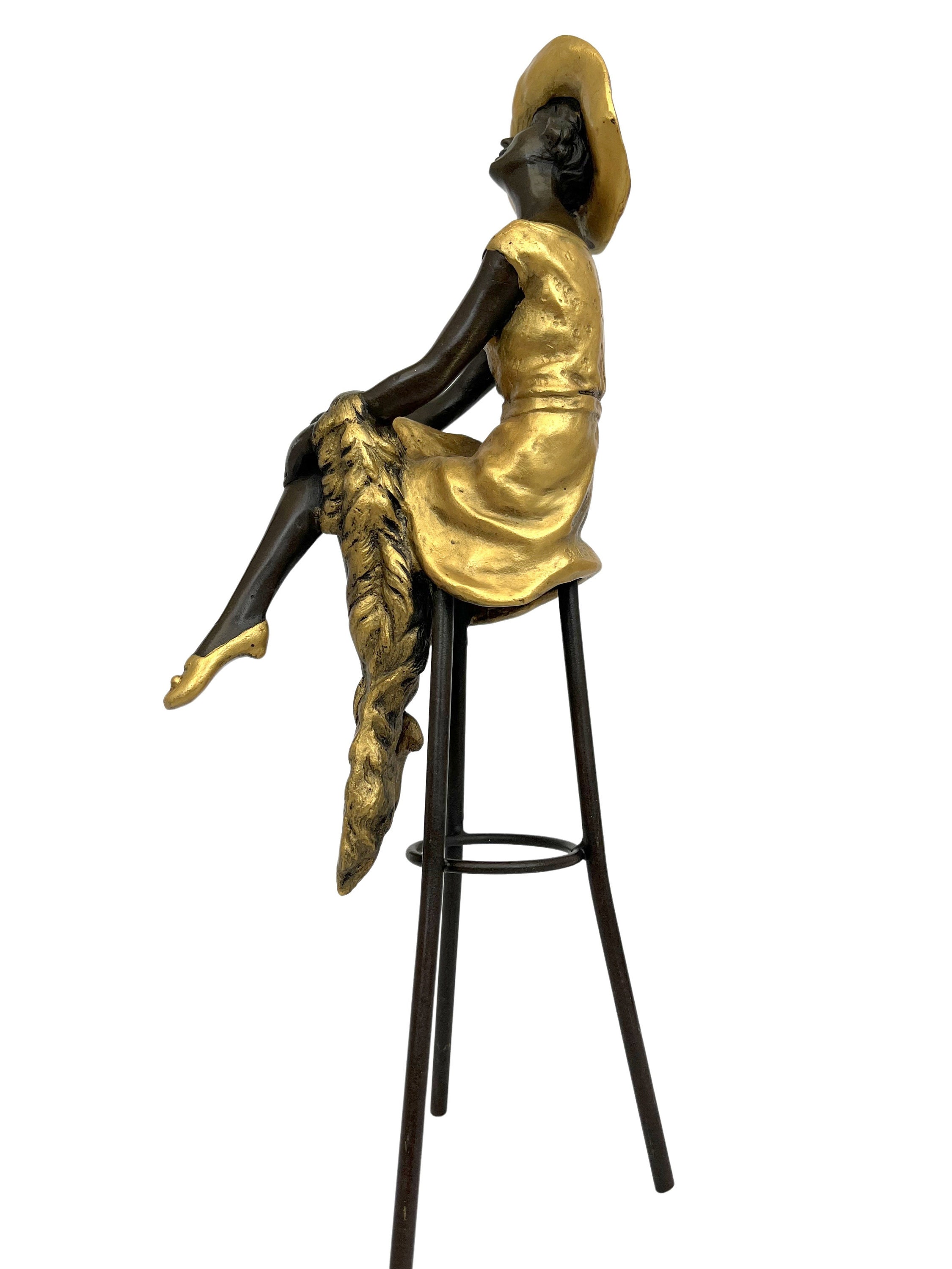 Bronze sculpture of a woman on a bar stool Graceful and elegant