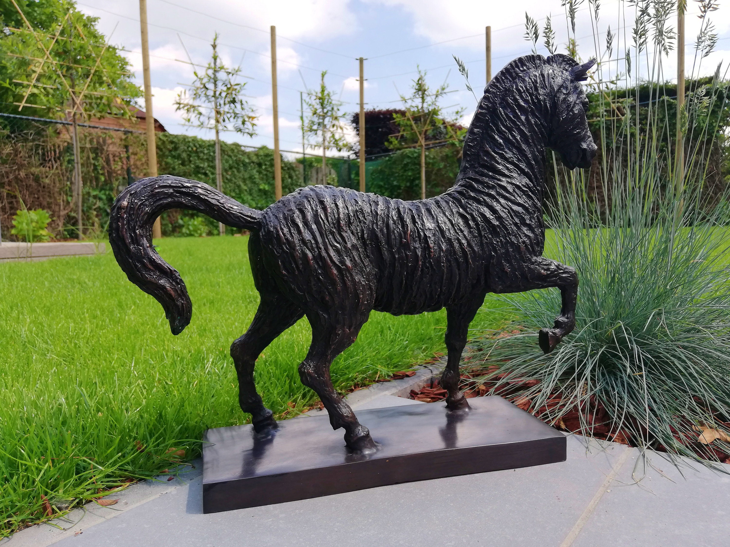 Bronze garden sculpture of a horse