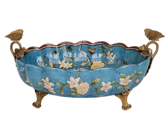 Enchanting blue Porcelain Decorative Bowl: Floral pattern and decorated with bronze butterflies and ornaments - a luxurious centerpiece