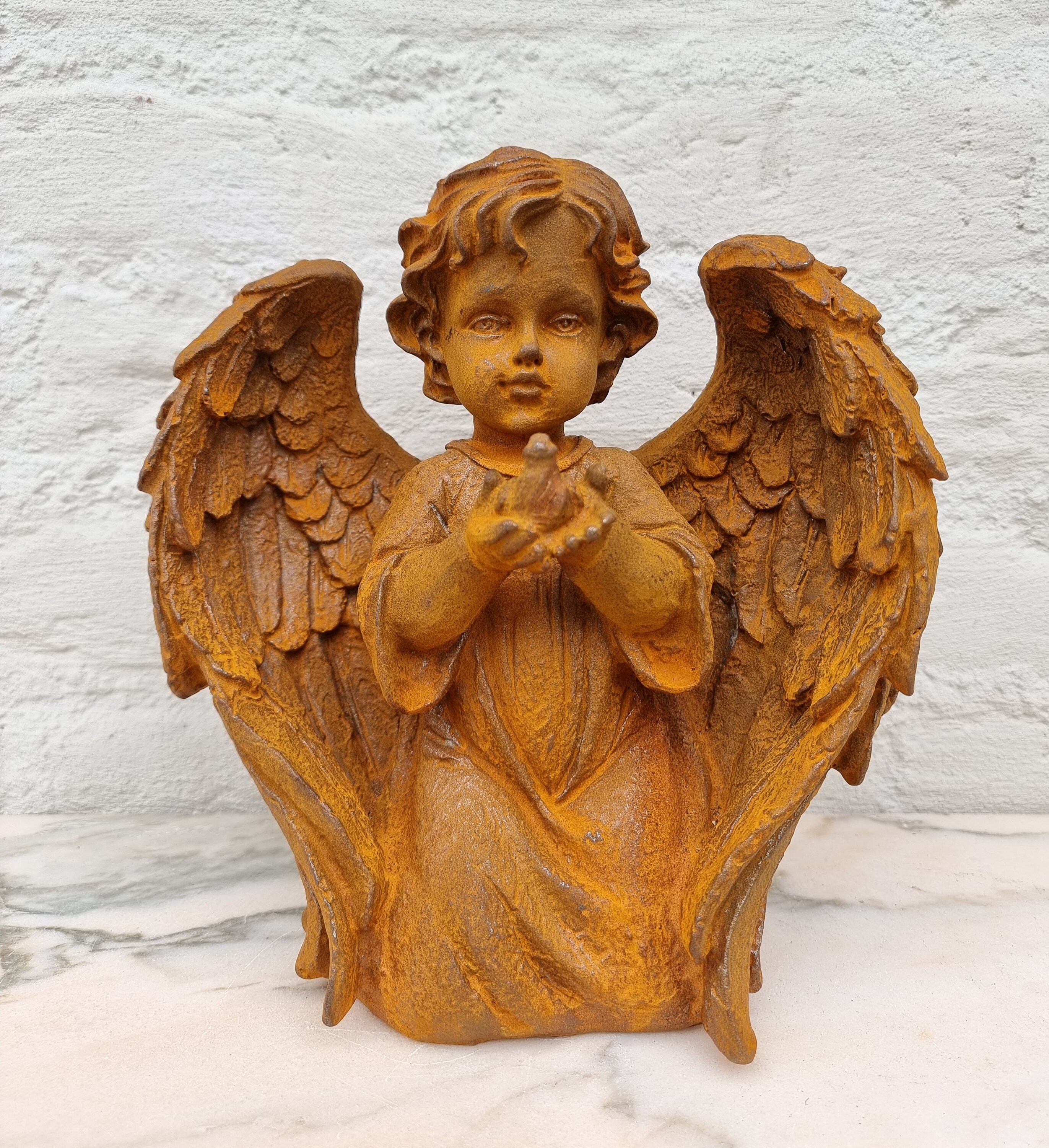 Sculpture of a kneeling Angel Praying angel Cast iron garden statues