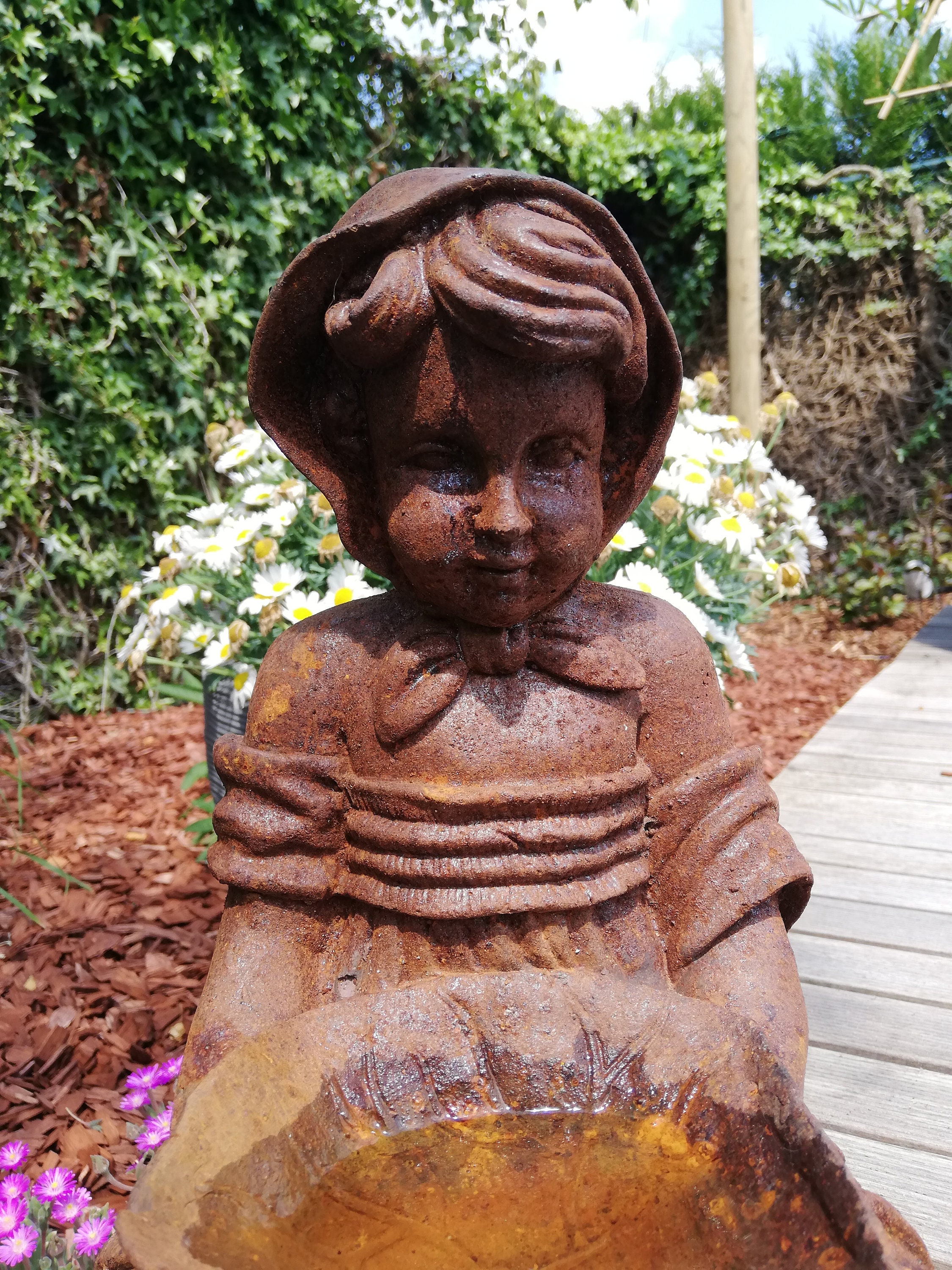 Classical sculpture of a farm girl Bird bath