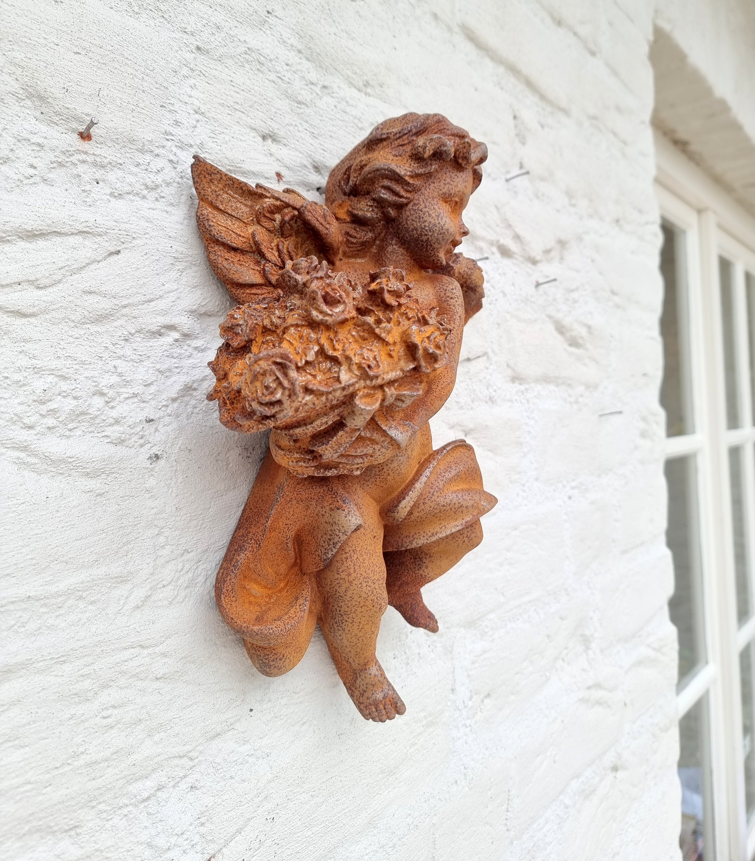 Cast iron wall sculpture of an Angel Cherub Christmas wall